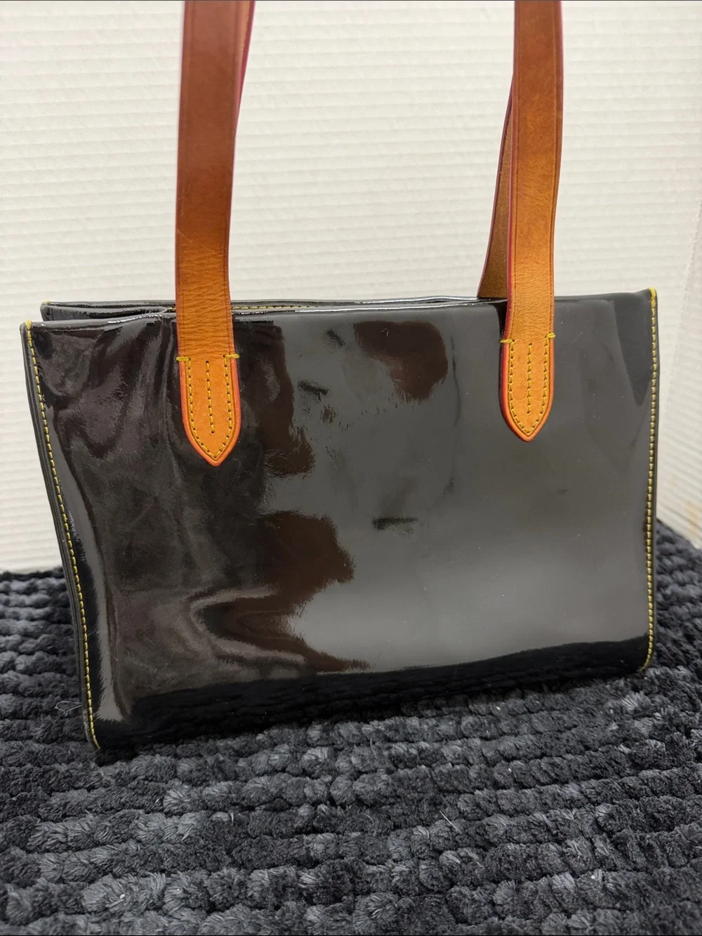 Dooney & Bourke Black Patent Tote with Brown Leather Handles